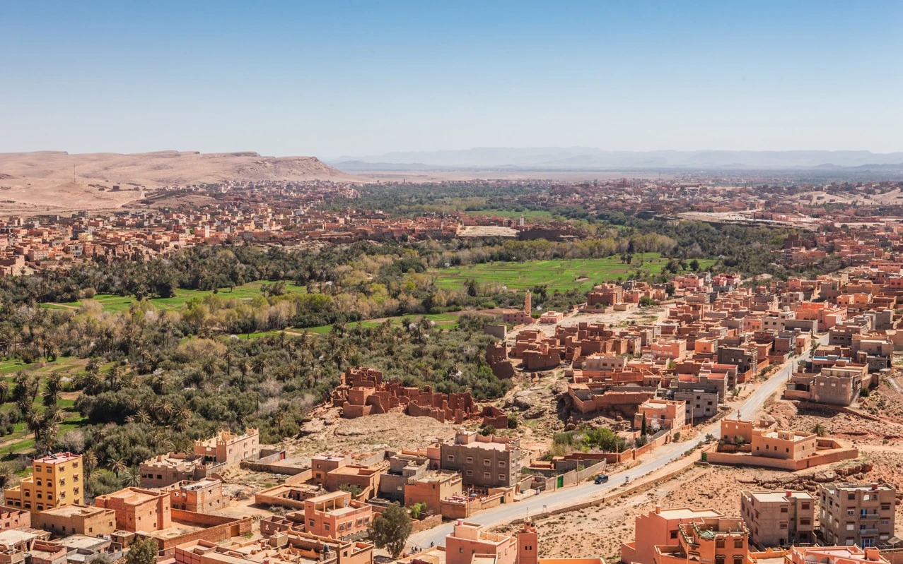 Discover Morocco: medina rooftops with the Atlas Mountains on the horizon