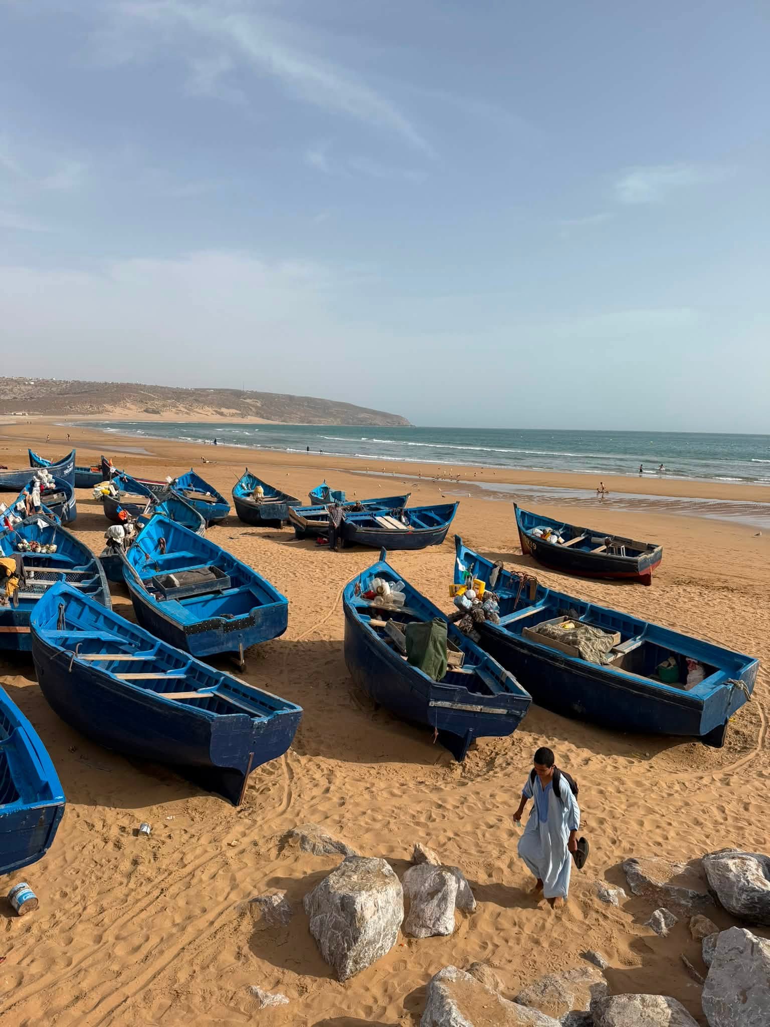 Essaouira harbour with blue fishing boats and ramparts